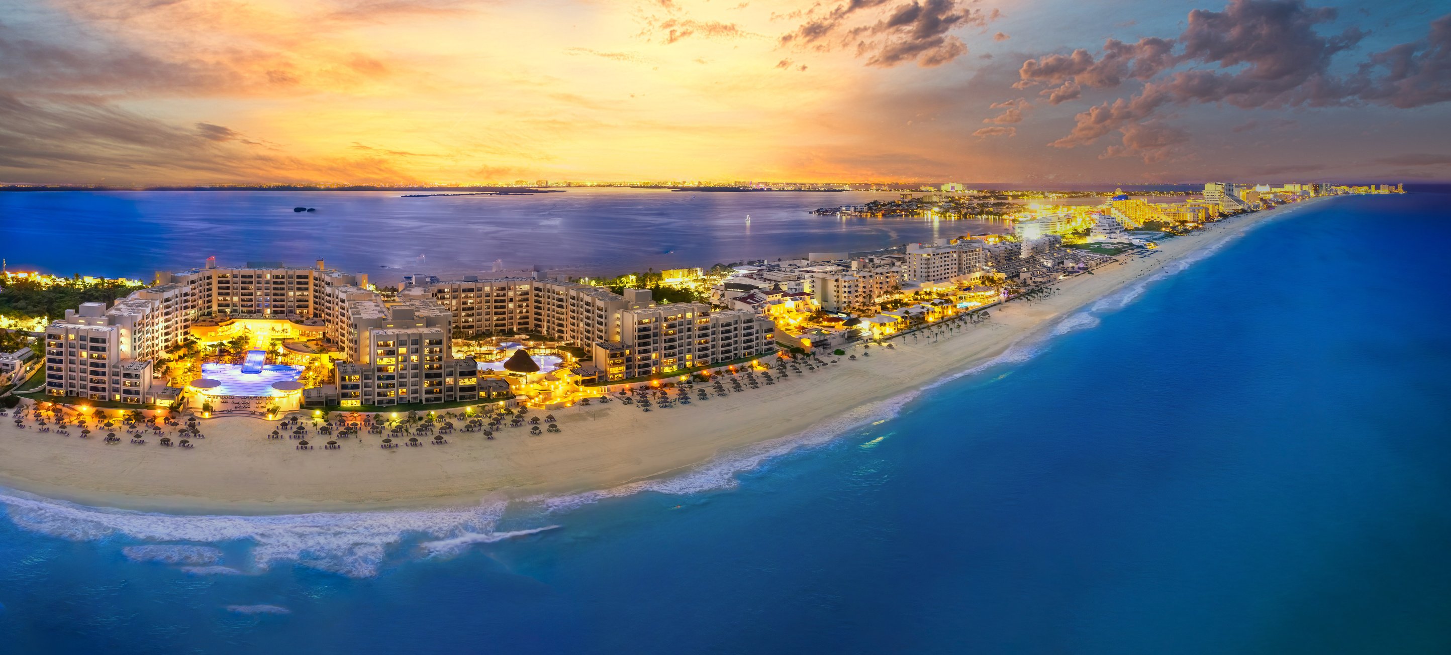 Cancun beach coast with sunsets